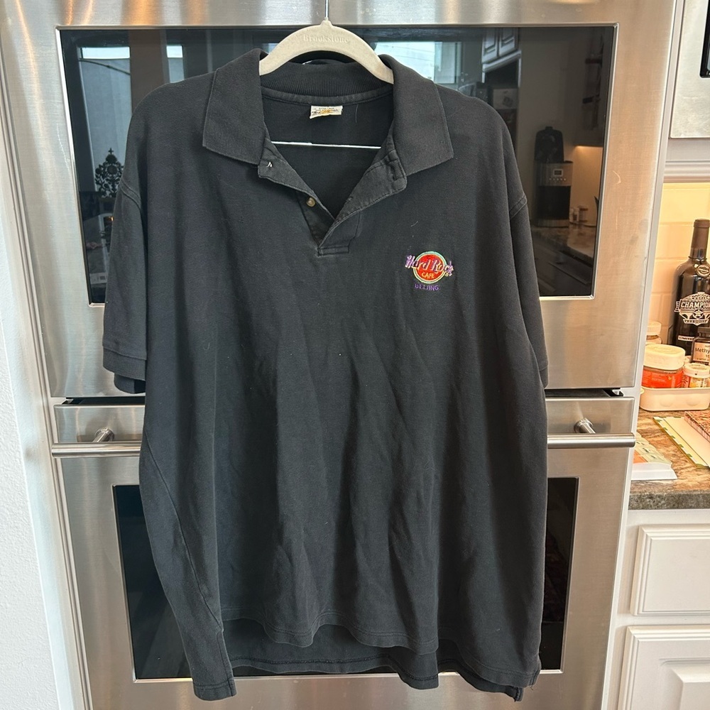 VINTAGE Hard Rock Cafe Black Polo Shirt Beijing, size XL, has slight wear